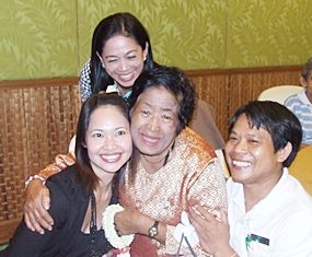 (Clockwise from left) Woranuch Suhsang, Sunne Weawmanee and Pramoal Iamma bring tears of joy to Grandmother Charoen Umphaiwong.